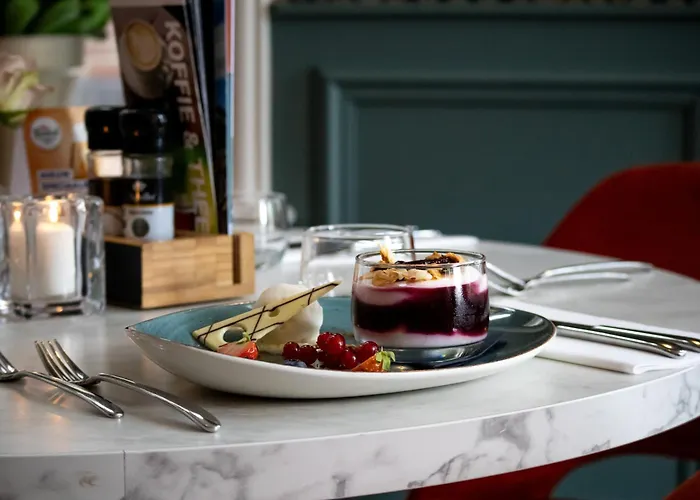 호텔 De Koppelpaarden 4*